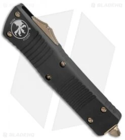 Microtech Combat Troodon D/E OTF Knife Black (3.8" Bronze Full Serr) 142-15 7 Microtech Combat Troodon D/E OTF Knife Black (3.8" Bronze Full Serr) 142-15 -Microtech Microtech Combat Troodon DE OTF Black Bronze Full Serr BHQ 135085 jr spine