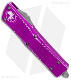 Microtech Combat Troodon D/E OTF Knife Violet Dist. (3.8" Stonewash Full Serr) -Microtech Microtech Combat Troodon DE Violet Distressed SW Full Serr 142 12DVI BHQ 104691 jr spine
