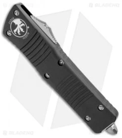 Microtech Combat Troodon OTF D/E Automatic Knife (3.8" Black Serr) 142-2 -Microtech Microtech Combat Troodon OTF DE Auto Black Serr 142 2 BHQ 4377 jr side
