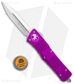 Microtech Combat Troodon OTF Knife D/E Dagger Violet (3.8" Satin Full Serr) -Microtech Microtech Combat Troodon OTF Dagger Violet Satin Full Serr 142 6VI BHQ 98100 jr bottlecap