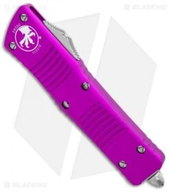 Microtech Combat Troodon OTF Knife D/E Dagger Violet (3.8" Satin Serr) -Microtech Microtech Combat Troodon OTF Dagger Violet Satin Serr 142 5VI BHQ 98095 jr spine
