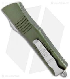Microtech Combat Troodon S/E OTF Automatic Knife OD Green (3.8" Stonewash) 8 Microtech Combat Troodon S/E OTF Automatic Knife OD Green (3.8" Stonewash) -Microtech Microtech Combat Troodon SE OTF Auto OD Green SW 143 10OD BHQ 98103 jr side