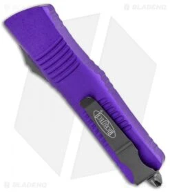 Microtech Combat Troodon S/E OTF Automatic Knife Purple (3.8" Black Serr) -Microtech Microtech Combat Troodon SE OTF Auto Pruple Black Serr 143 2PU BHQ 98125 jr side