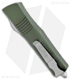 Microtech Combat Troodon T/E Automatic OTF Knife OD Green (3.8" SW Serr) -Microtech Microtech Combat Troodon Tanto OD Green SW Serr 144 11OD BHQ 98204 jr side