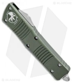 Microtech Combat Troodon T/E Automatic OTF Knife OD Green (3.8" SW Serr) -Microtech Microtech Combat Troodon Tanto OD Green SW Serr 144 11OD BHQ 98204 jr spine
