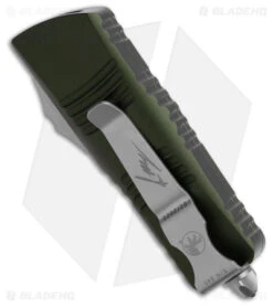 Microtech Mini Troodon Hellhound SS Automatic OTF Knife OD Green (1.9" SW) 7 Microtech Mini Troodon Hellhound SS Automatic OTF Knife OD Green (1.9" SW) -Microtech Microtech Mini Troodon Hellhound SS Automatic OTF Knife OD Green 1in SW BHQ 181948 td side