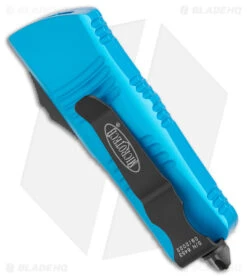 Microtech Troodon Mini D/E OTF Automatic Knife Turquoise (1.9" Black) -Microtech Microtech Troodon Mini DE OTF Auto Turquoise Black BHQ 176097 jr side