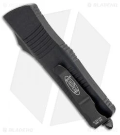 Microtech Troodon D/E OTF Automatic Knife Tactical (3" Black Full Serr) 138-3T 8 Microtech Troodon D/E OTF Automatic Knife Tactical (3" Black Full Serr) 138-3T -Microtech Microtech Troodon OTF Auto Black Tactical Dagger 138 3T BHQ 11847 ns side