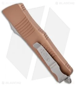 Microtech Troodon D/E OTF Automatic Knife Tan (3" Stonewash) 138-10TA 8 Microtech Troodon D/E OTF Automatic Knife Tan (3" Stonewash) 138-10TA -Microtech Microtech Troodon OTF Auto Tan Dagger 138 10TA BHQ 27161 ns side