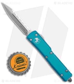 Microtech UTX-70 D/A OTF D/E Automatic Knife Turquoise (Stonewash Full Serr) 9 Microtech UTX-70 D/A OTF D/E Automatic Knife Turquoise (Stonewash Full Serr) -Microtech Microtech UTX 70 DA OTF DE AK Turquoise SW Full Serr BHQ 98282 td size