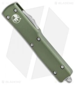 Microtech UTX-70 D/A OTF Automatic Knife OD Green (Apocalyptic Full Serr) -Microtech Microtech UTX 70 DA OTF DE Automatic Knife OD Green Apocalyptic Full Serr 147 12APOD BHQ 115741 LS Spine