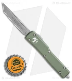 Microtech UTX-70 Tanto Automatic OTF Knife Green (2.4" Apocalyptic) 149-10AP -Microtech Microtech UTX 70 Tanto Automatic OTF Knife Green 2.4in Apocalyptic149 10AP BHQ 115735 LS Bottlecap