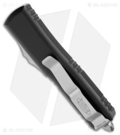 Microtech UTX-85 D/E OTF Automatic Double Serrated Knife Black (3.13" SW) -Microtech Microtech UTX 85 DE OTF Auto Black SW Double Serr BHQ 180397 jr side