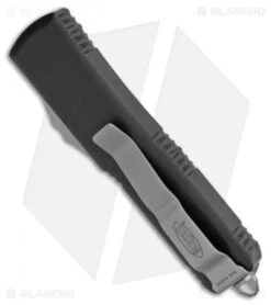 Microtech UTX-85 D/E OTF Automatic Knife Black (3.125" Satin Full Serr) -Microtech Microtech UTX 85 DE OTF Auto Black Satin Full Serr 232 6 BHQ 98519 jr side