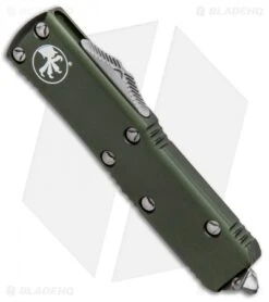 Microtech UTX-85 D/E OTF Automatic Knife OD Green (3.125" Satin Full Serr) 7 Microtech UTX-85 D/E OTF Automatic Knife OD Green (3.125" Satin Full Serr) -Microtech Microtech UTX 85 DE OTF Auto OD Green Satin Serr Full 232 6OD BHQ 90985 jr spine