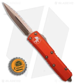 Microtech UTX-85 Dagger D/E OTF Auto Knife Orange Al (3.1" Serr Bronze) 232-15OR -Microtech Microtech UTX 85 Dagger DE OTF AK Orange 3in Bronze BHQ 181093 td size