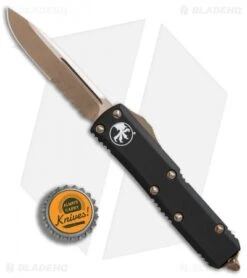 Microtech UTX-85 S/E OTF Automatic Knife Black (3.1" Bronze Serr) -Microtech Microtech UTX 85 SE black bronze serr BHQ 75684 er bottlecap