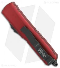 Microtech UTX-85 S/E OTF Automatic Knife Red (3.125" Black Serr) 231-2RD 8 Microtech UTX-85 S/E OTF Automatic Knife Red (3.125" Black Serr) 231-2RD -Microtech Microtech UTX 85 SE red black serr 231 2RD BHQ 69049 er side