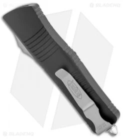 Microtech Ultratech OTF D/E Automatic Knife CC (3.4" SW Full Serr) 122-12 -Microtech Microtech Ultratech DE OTF Auto CC Black SW Full Serr 122 12 BHQ 52160 jr side