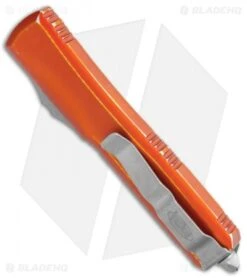 Microtech Ultratech D/E OTF Auto Knife Distressed Orange (3.4" BB/SW Full Serr) -Microtech Microtech Ultratech DE OTF Auto Distressed Orange BB SW Full Serr 122 12DOR BHQ 113057 jr side