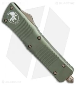 Microtech Combat Troodon D/E OTF Knife OD Green (3.8" Bronze) 142-13OD 6 Microtech Combat Troodon D/E OTF Knife OD Green (3.8" Bronze) 142-13OD -Microtech microtech combat troodon DE OD green bronze 142 13OD BHQ 50396 er spine